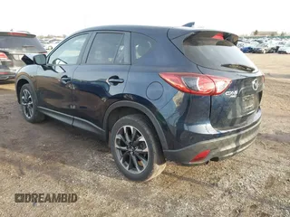 2016 Mazda CX-5 Grand Touring with VIN JM3KE4DY1G0823989, listed as a IAAI auction lot 41770149 with 40,677 mi miles. Bid and sale history available at carsss.com. Image 3.