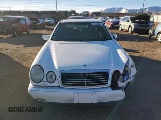 1999 Mercedes-Benz E-Class with VIN WDBJF82H1XX024280, listed as a Copart auction lot 83213204 with 212,712 mi miles and Salvage Title. Bid and sale history available at carsss.com. Image 5.