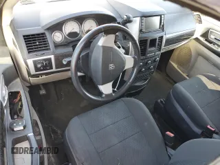 2010 Dodge Grand Caravan SXT with VIN 2D4RN5D17AR307328, listed as a Copart auction lot 49983425 with Not Provided miles and Clean Title. Bid and sale history available at DreamBid. Image 8.