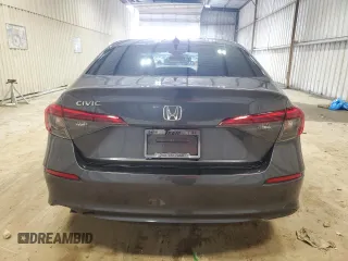 2023 Honda Civic EX z VIN 2HGFE1F71PH311773, wystawiony jako Copart lot #59987065 z przebiegiem 40 525 mil mil oraz Czysty tytuł • Clean title. Historia ofert i sprzedaży dostępna na DreamBid. Obrazek 6.