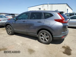 2019 Honda CR-V EX-L with VIN 5J6RW2H85KL001362, listed as a Copart auction lot 52112505 with 57,004 mi miles and Salvage Title. Bid and sale history available at carsss.com. Image 2.