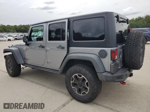 2013 Jeep Wrangler Unlimited Rubicon 10th Anniversary z VIN 1C4HJWFG3DL703331, wystawiony jako Copart lot #70823154 z przebiegiem 148 860 mil mil oraz Szkoda całkowita • Salvage title. Historia ofert i sprzedaży dostępna na DreamBid. Obrazek 2.