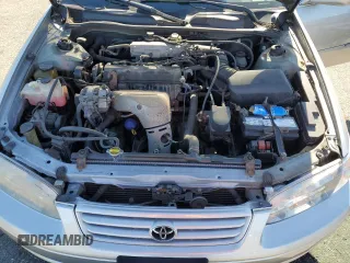 2000 Toyota Camry CE z VIN 4T1BG22K2YU711908, wystawiony jako Copart lot #56294515 z przebiegiem 110 871 mil mil oraz Szkoda całkowita • Salvage title. Historia ofert i sprzedaży dostępna na DreamBid. Obrazek 11.