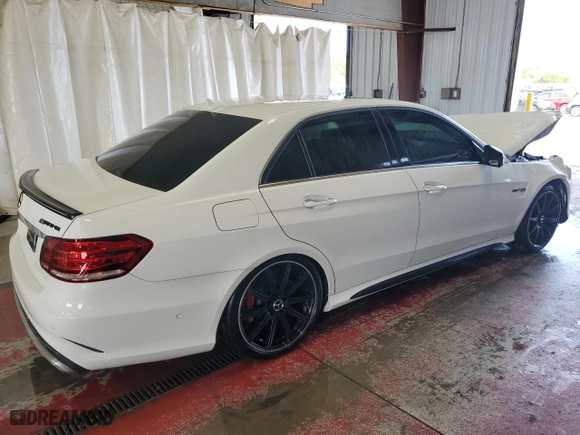 2014 Mercedes-Benz E-Class E 63 AMG S-Model with VIN WDDHF7GBXEA924082, listed as a Copart auction lot 56497264 with 67,542 mi miles and Salvage Title. Bid and sale history available at carsss.com. Image 3.