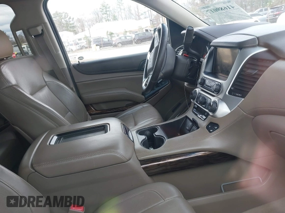 2015 GMC Yukon XL SLT with VIN 1GKS1HKC7FR126375, listed as a IAAI auction lot 41689017 with 218,622 mi miles. Bid and sale history available at carsss.com. Image 5.
