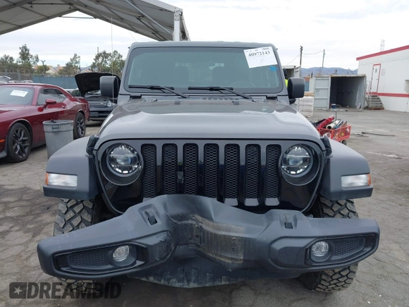 2022 Jeep Wrangler Willys Sport with VIN 1C4GJXAN7NW252931, listed as a IAAI auction lot 40972143 with 12,823 mi miles and . Bid and sale history available at DreamBid. Image 12.