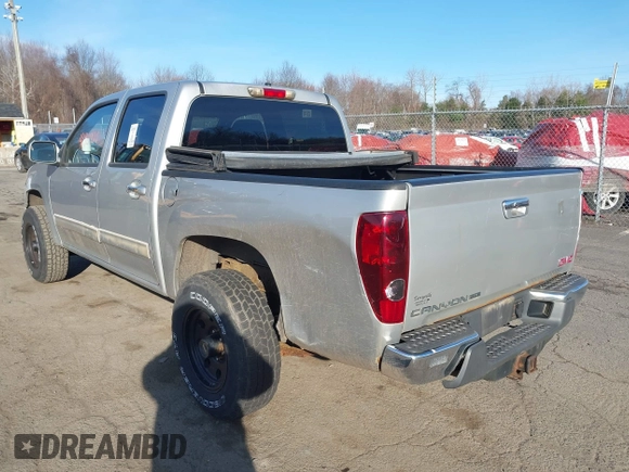2012 GMC Canyon SLE1 with VIN 1GTH6MFE2C8106354, listed as a IAAI auction lot 41910921 with 127,812 mi miles. Bid and sale history available at carsss.com. Image 3.