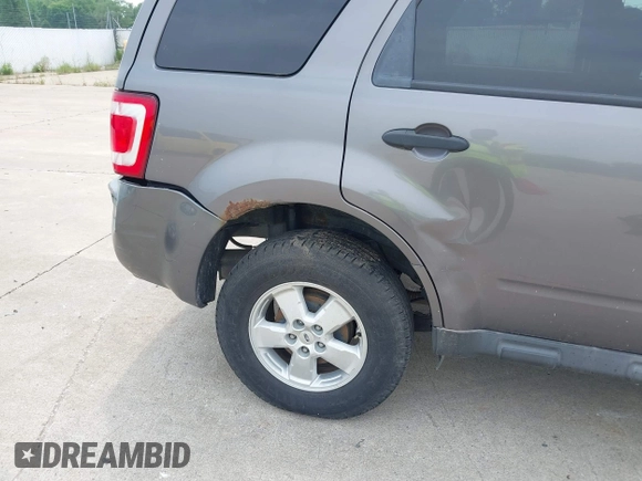 2010 Ford Escape XLT с VIN 1FMCU9DG1AKD06848, выставлен на аукционе IAAI как лот 42409555 с пробегом 310 043 миль миль и . История ставок и продаж доступна на DreamBid. Изображение 14.