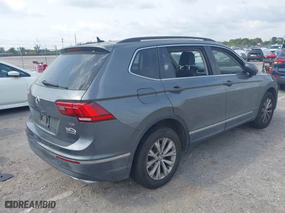 2018 Volkswagen Tiguan SEL with VIN 3VV3B7AX4JM211360, listed as a IAAI auction lot 41860362 with 75,979 mi miles. Bid and sale history available at carsss.com. Image 4.