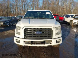 2015 Ford F-150 XLT w/HD Payload Pkg with VIN 1FTFW1EF6FFC66723, listed as a IAAI auction lot 41303476 with 203,999 mi miles. Bid and sale history available at carsss.com. Image 12.