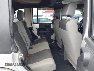 2007 Jeep Wrangler Unlimited X with VIN 1J4GA39187L209448, listed as a IAAI auction lot 42104328 with 138,302 mi miles and . Bid and sale history available at DreamBid. Image 8.