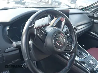 2022 Mazda CX-9 Grand Touring with VIN JM3TCBDYXN0618313, listed as a IAAI auction lot 41452750 with 34,356 mi miles and . Bid and sale history available at DreamBid. Image 11.