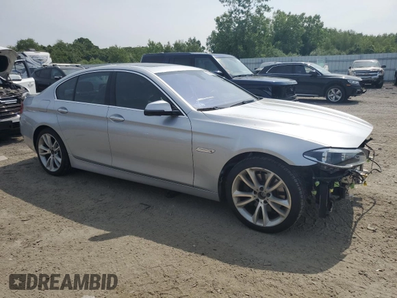 2014 BMW 5 Series 535i xDrive with VIN WBA5B3C5XED530918, listed as a Copart auction lot 60143395 with 104,784 mi miles and Clean title. Bid and sale history available at DreamBid. Image 4.