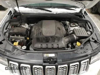 2019 Jeep Grand Cherokee Summit with VIN 1C4RJFJT2KC541777, listed as a Copart auction lot 37762784 with 99,248 mi miles and Salvage Title. Bid and sale history available at carsss.com. Image 12.