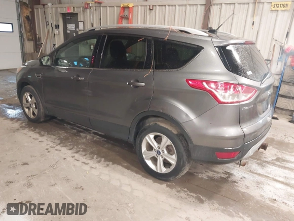 2014 Ford Escape SE with VIN 1FMCU9G95EUE19998, listed as a IAAI auction lot 42217195 with 163,934 mi miles and . Bid and sale history available at DreamBid. Image 3.