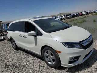 2019 Honda Odyssey EX-L z VIN 5FNRL6H71KB061252, wystawiony jako Copart lot #56358015 z przebiegiem 75 556 mil mil oraz Szkoda całkowita • Salvage title. Historia ofert i sprzedaży dostępna na DreamBid. Obrazek 4.
