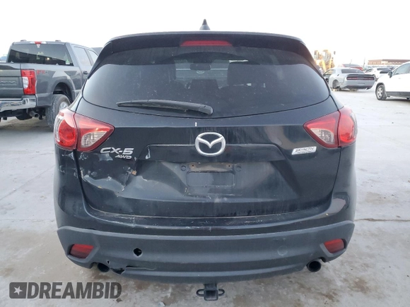 2014 Mazda CX-5 Grand Touring with VIN JM3KE4DY5E0386043, listed as a Copart auction lot 48866995 with 183,626 mi miles and Salvage Title. Bid and sale history available at DreamBid. Image 6.