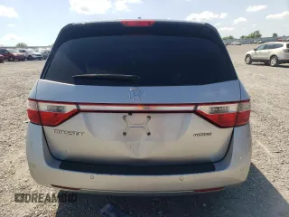 2012 Honda Odyssey Touring with VIN 5FNRL5H94CB009952, listed as a Copart auction lot 54322695 with 135,551 mi miles and Salvage title. Bid and sale history available at DreamBid. Image 6.