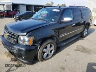 2013 Chevrolet Suburban LTZ with VIN 1GNSKKE79DR105097, listed as a Copart auction lot 89392815 with 100,177 mi miles and Salvage Title. Bid and sale history available at carsss.com. Image 1.
