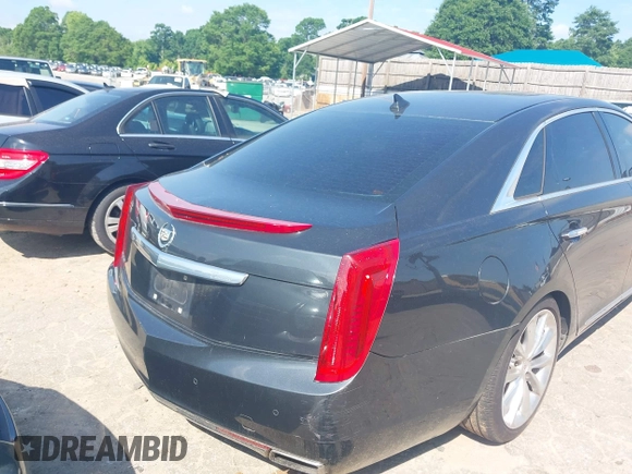 2013 Cadillac XTS Luxury z VIN 2G61P5S37D9110658, wystawiony jako IAAI lot #42196442 z przebiegiem 182 228 mil mil oraz . Historia ofert i sprzedaży dostępna na DreamBid. Obrazek 4.