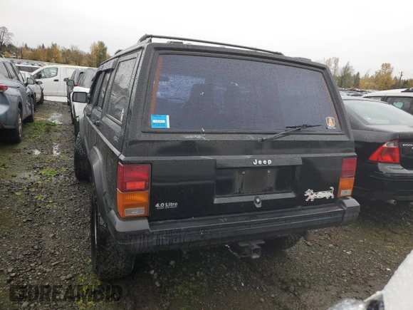 1996 Jeep Cherokee Sport with VIN 1J4FJ68S4TL240696, listed as a Copart auction lot 81193184 with 125,682 mi miles and Salvage Title. Bid and sale history available at carsss.com. Image 6.