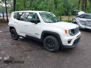 2022 Jeep Renegade Sport z VIN ZACNJDA1XNPN56798, wystawiony jako IAAI lot #42390076 z przebiegiem 14 989 mil mil oraz . Historia ofert i sprzedaży dostępna na DreamBid. Obrazek 1.