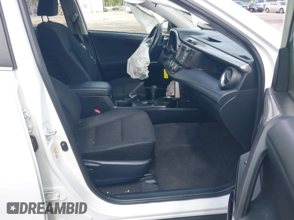 2017 Toyota RAV4 LE with VIN JTMBFREV8HJ700774, listed as a IAAI auction lot 42439345 with 96,907 mi miles and . Bid and sale history available at DreamBid. Image 5.