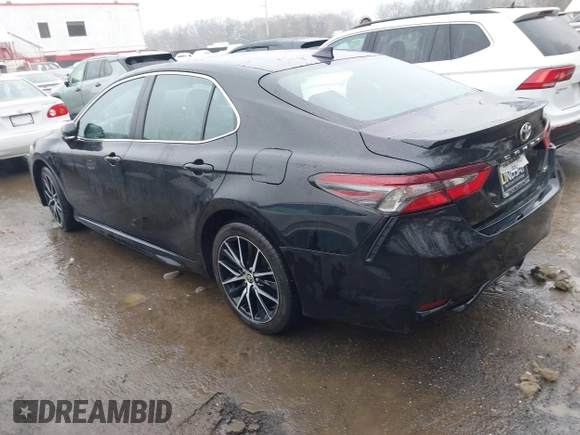 2022 Toyota Camry SE with VIN 4T1G11AK9NU714724, listed as a IAAI auction lot 41504720 with 63,237 mi miles. Bid and sale history available at carsss.com. Image 3.