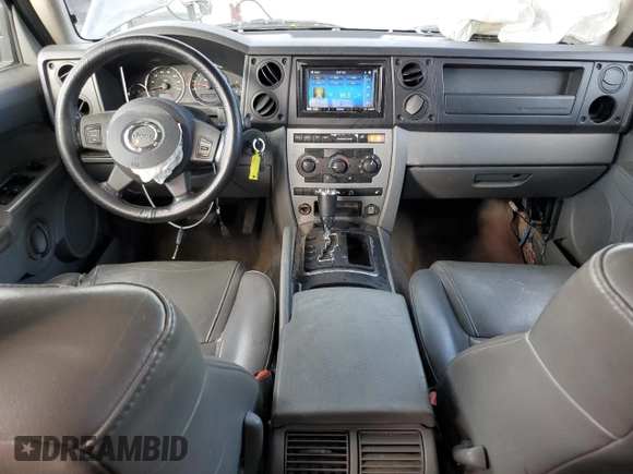 2006 Jeep Commander with VIN 1J8HH48N46C133122, listed as a Copart auction lot 80821094 with 216,412 mi miles and Salvage Title. Bid and sale history available at carsss.com. Image 8.