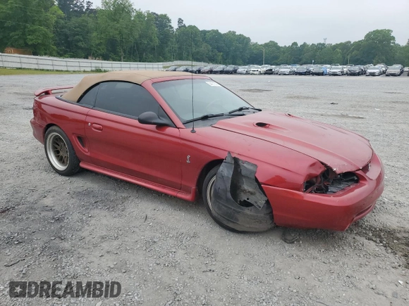 1996 Ford Mustang Cobra with VIN 1FALP46V7TF187912, listed as a Copart auction lot 54401505 with 116,465 mi miles and Salvage title. Bid and sale history available at DreamBid. Image 4.
