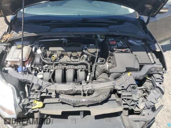 2014 Ford Focus SE z VIN 1FADP3K24EL317353, wystawiony jako Copart lot #57181215 z przebiegiem 144 495 mil mil oraz Szkoda całkowita • Salvage title. Historia ofert i sprzedaży dostępna na DreamBid. Obrazek 11.