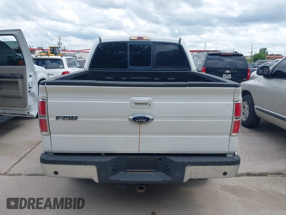 2011 Ford F-150 XLT with VIN 1FTFW1CT7BFA59275, listed as a IAAI auction lot 42111709 with 203,718 mi miles. Bid and sale history available at carsss.com. Image 16.