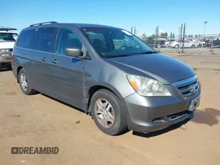 2007 Honda Odyssey EX-L with VIN 5FNRL386X7B405321, listed as a IAAI auction lot 41703384 with 198,552 mi miles. Bid and sale history available at carsss.com. Image 1.