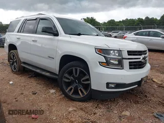 2018 Chevrolet Tahoe LT z VIN 1GNSKBKC9JR132670, wystawiony jako IAAI lot #42248273 z przebiegiem 136 636 mil mil oraz . Historia ofert i sprzedaży dostępna na DreamBid. Obrazek 1.