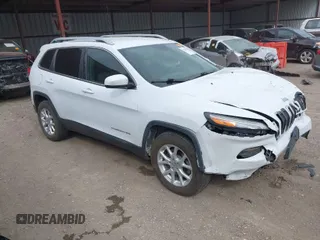 2015 Jeep Cherokee Latitude with VIN 1C4PJMCS1FW541757, listed as a IAAI auction lot 41836524 with 95,184 mi miles. Bid and sale history available at carsss.com. Image 1.