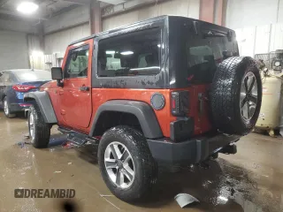 2009 Jeep Wrangler Rubicon with VIN 1J4GA64179L733136, listed as a Copart auction lot 43747805 with 94,899 mi miles and Salvage Title. Bid and sale history available at DreamBid. Image 2.