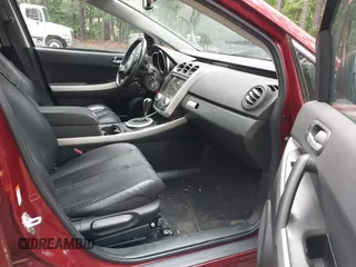 2007 Mazda CX-7 Sport z VIN JM3ER293470137299, wystawiony jako IAAI lot #42236564 z przebiegiem 179 510 mil mil oraz . Historia ofert i sprzedaży dostępna na DreamBid. Obrazek 5.