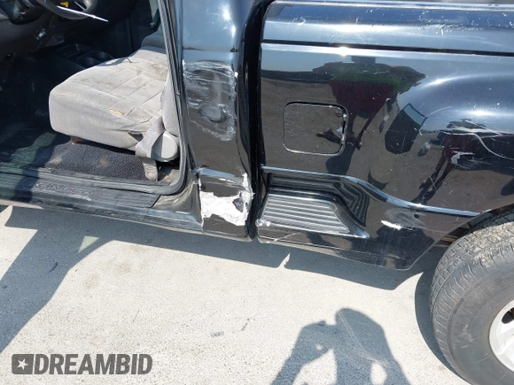 2002 Ford Ranger XL z VIN 1FTYR10U42PA72394, wystawiony jako IAAI lot #42316547 z przebiegiem 142 300 mil mil oraz . Historia ofert i sprzedaży dostępna na DreamBid. Obrazek 6.