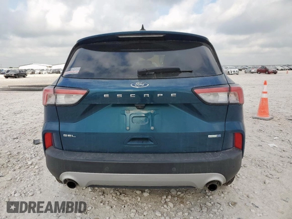2020 Ford Escape SEL с VIN 1FMCU9H69LUB21780, выставлен на аукционе Copart как лот 58129025 с пробегом 69 511 миль миль и Списание • Salvage title. История ставок и продаж доступна на DreamBid. Изображение 6.