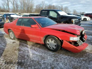 2002 Cadillac Eldorado z VIN 1G6EC12972B106132, wystawiony jako Copart lot #86799624 z przebiegiem 75 334 mil mil oraz Szkoda całkowita • Salvage title. Historia ofert i sprzedaży dostępna na DreamBid. Obrazek 4.