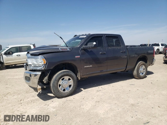 2021 Ram 2500 Tradesman with VIN 3C6UR5CJ0MG561557, listed as a Copart auction lot 50976935 with 98,567 mi miles and Salvage title. Bid and sale history available at DreamBid. Image 1.