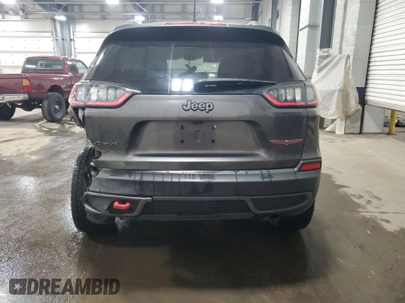 2019 Jeep Cherokee Trailhawk with VIN 1C4PJMBXXKD362555, listed as a Copart auction lot 88888565 with 120,673 mi miles and Salvage Title. Bid and sale history available at DreamBid. Image 6.