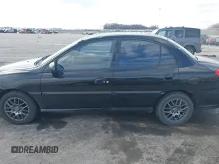 2005 Kia Rio with VIN KNADC125X56377797, listed as a IAAI auction lot 41685739 with 103,390 mi miles. Bid and sale history available at carsss.com. Image 14.