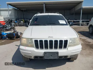 2003 Jeep Grand Cherokee Laredo with VIN 1J4GX48S43C518584, listed as a IAAI auction lot 42213094 with 163,743 mi miles and . Bid and sale history available at DreamBid. Image 13.