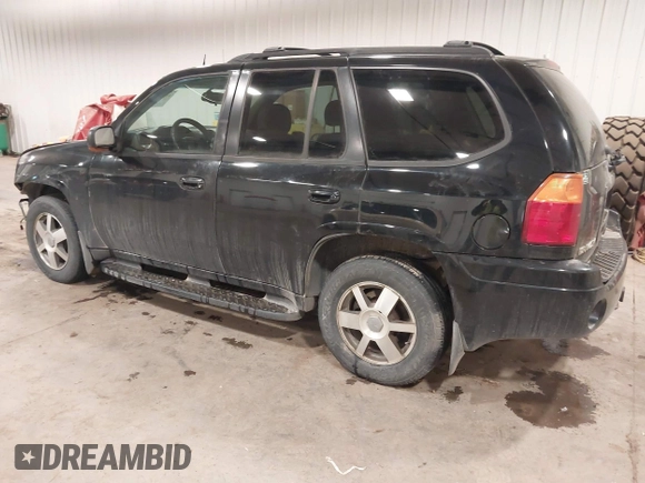 2005 GMC Envoy SLT with VIN 1GKDT13S452349125, listed as a IAAI auction lot 41148381 with 224,049 mi miles. Bid and sale history available at carsss.com. Image 3.