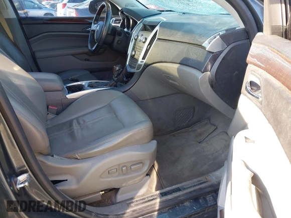 2011 Cadillac SRX Performance Collection with VIN 3GYFNBEYXBS527765, listed as a IAAI auction lot 41904013 with 168,318 mi miles and . Bid and sale history available at carsss.com. Image 5.
