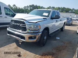 2022 Ram 2500 Tradesman with VIN 3C6UR4HJ2NG208791, listed as a IAAI auction lot 42428957 with 70,960 mi miles and . Bid and sale history available at DreamBid. Image 2.