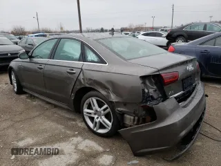 2016 Audi A6 2.0T Premium Plus with VIN WAUGFAFC9GN143513, listed as a Copart auction lot 68747952 with 72,860 mi miles. Bid and sale history available at carsss.com. Image 2.