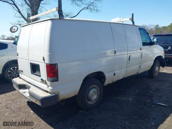 2003 Ford Econoline Cargo Van with VIN 1FTNE24LX3HA42513, listed as a IAAI auction lot 41858493 with 316,475 mi miles. Bid and sale history available at carsss.com. Image 4.