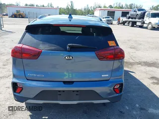 2021 Kia Niro Touring with VIN KNDCC3LC3M5483455, listed as a IAAI auction lot 41678795 with 132,216 mi miles. Bid and sale history available at carsss.com. Image 16.